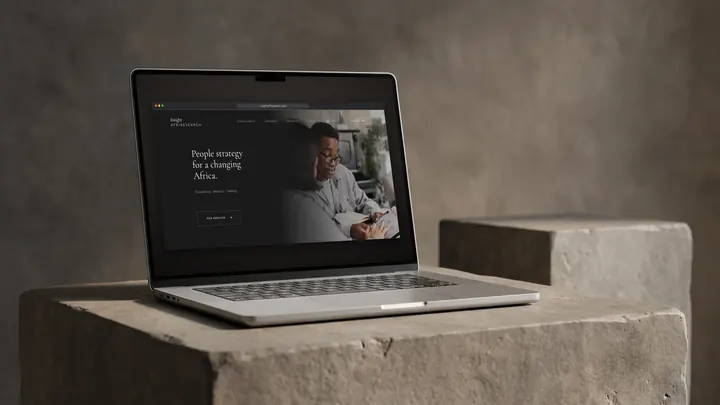 Insight AfriResearch website shown on a laptop